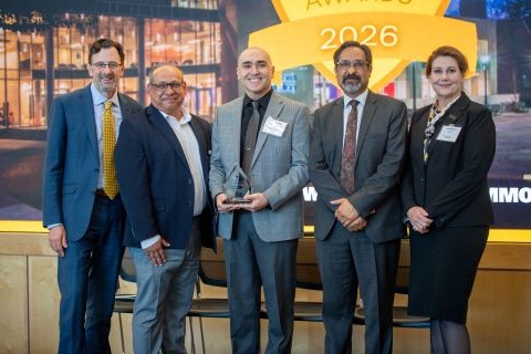 Can E. Senkal receiving an award, standing with the vice president for research development, vice president for research, the provost, and the associate vice president for research at the 2026 ARIA event.