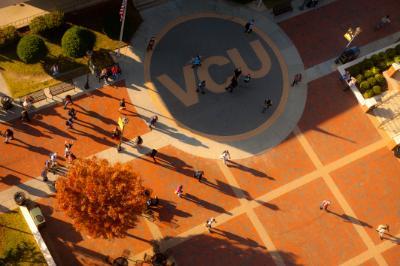 VCU letters on the sidewalk